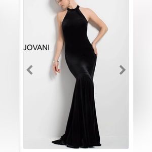 High neck, velvet black formal dress w/small train.Worn once for a military ball